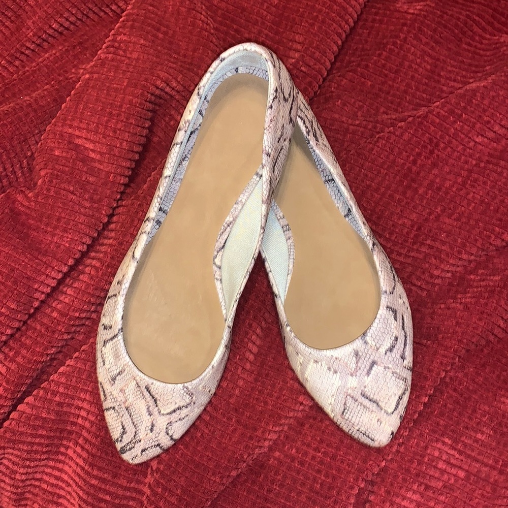 Snake print slip ons